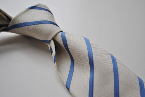 ivory tie with blue club stripes